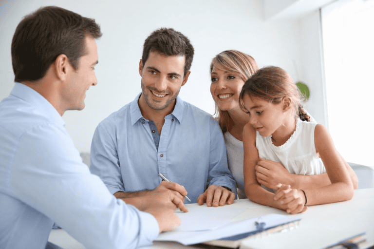 Family consulting with financial advisor for planning and advice.